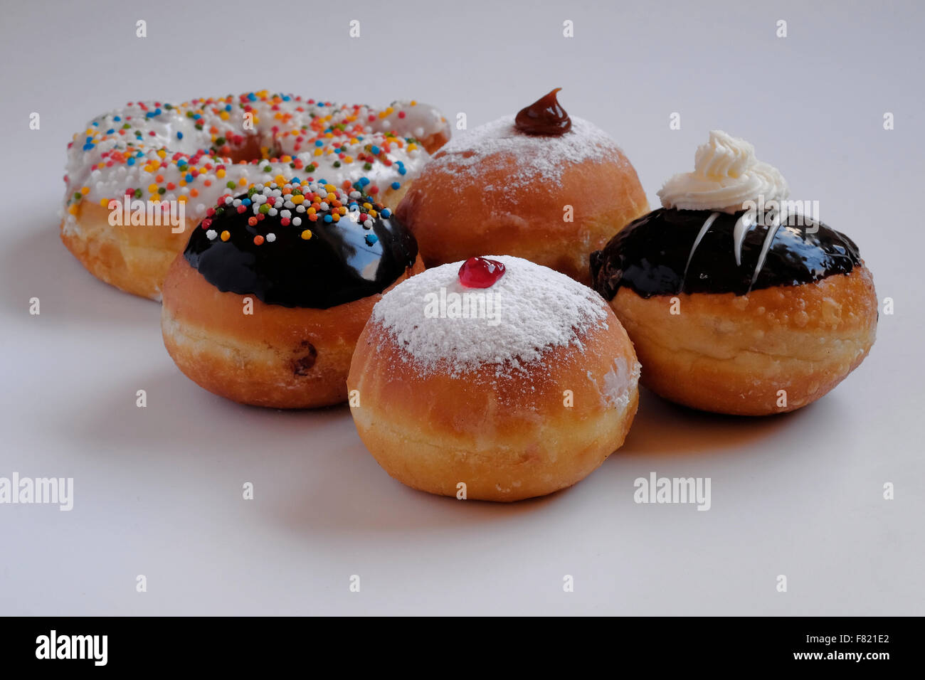 Elegantly traditional Sufganiyot deep fried round doughnut eaten during