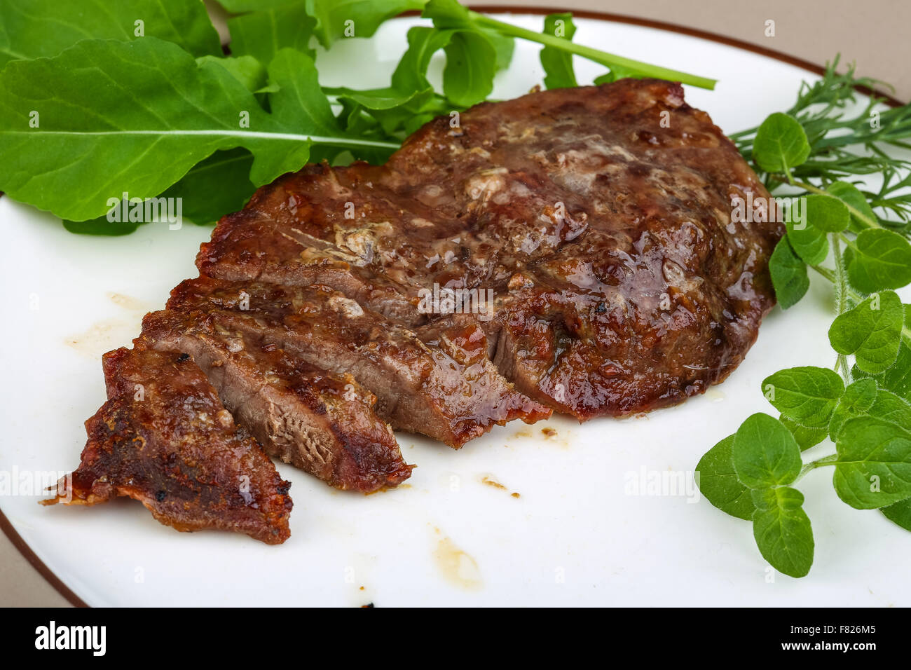 Roasted beef steak with dill, ruccola and spices Stock Photo Alamy