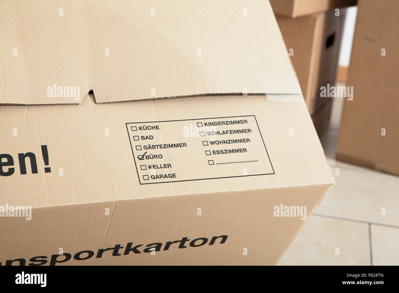 a carton for a move to the text office Stock Photo