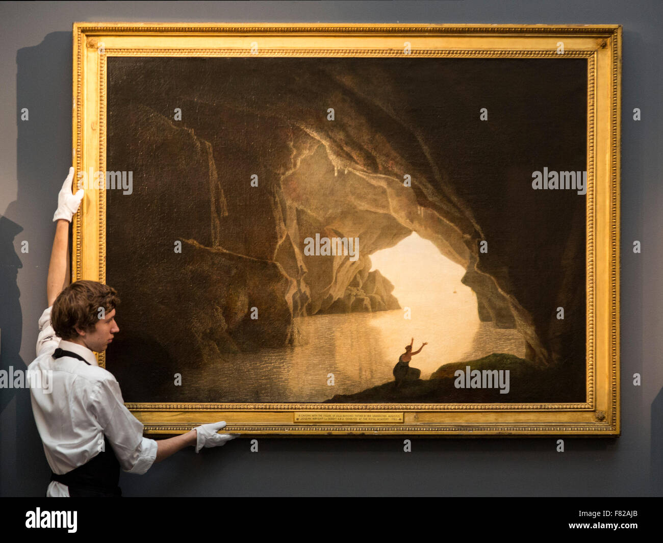London, UK. 4 December 2015. Pictured: A grotto in the Gulf of Salerno with the figure of Julia, banished from Rome by Joseph Wright of Derby, estimate: GBP 100,000-150,000. This work has been donated to The United Society and will be auction in order to raise funds for the relief of the Syrian refugee crisis in Europe. Press preview of Sotheby's London Evening Sale of Old Master and British Paintings, featuring many museum-quality works kept for centuries in prestigious private collections. The sale takes place on 9 December 2015. Stock Photo