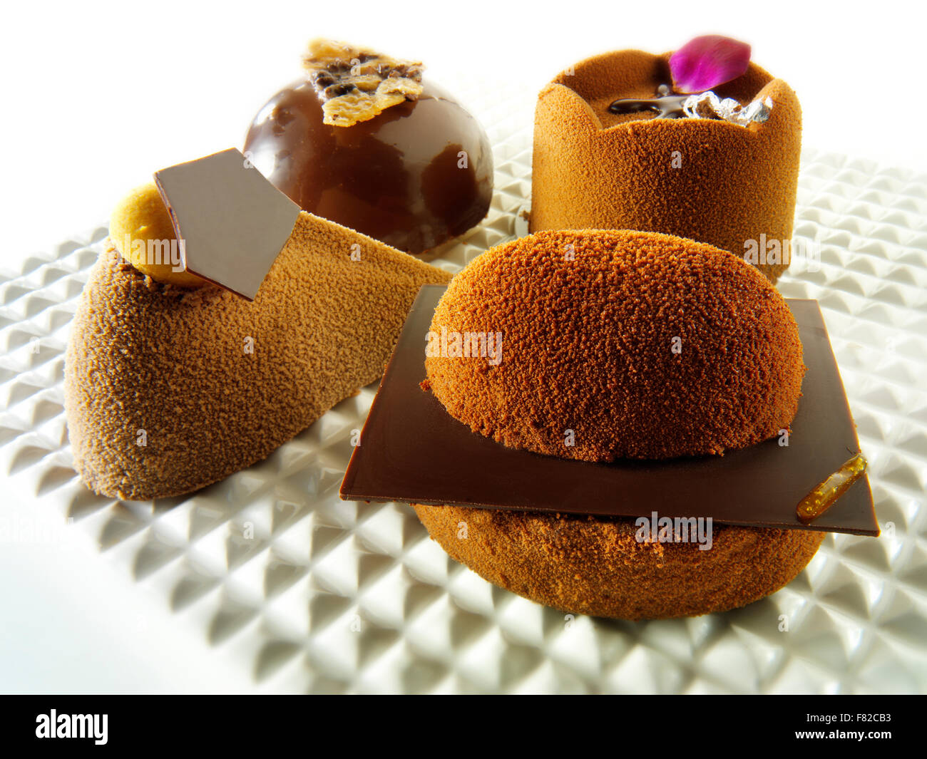a selection of rich hand made patisserie speciality rich indulgent chocolate cakes. Stock Photo