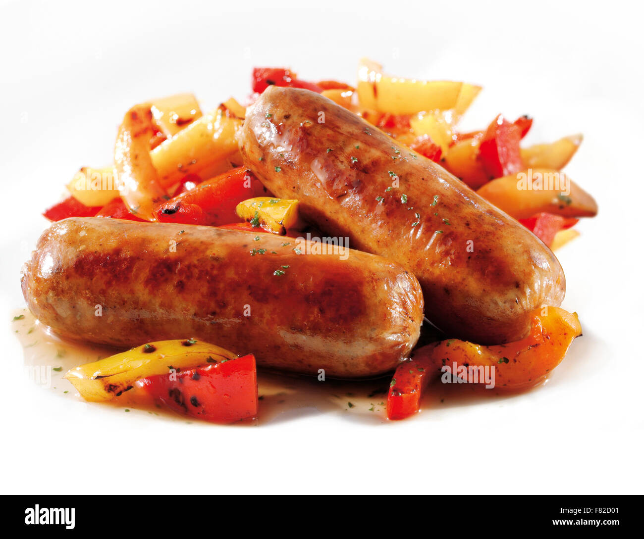 Traditional cooked pork sausage with roast peppers Stock Photo