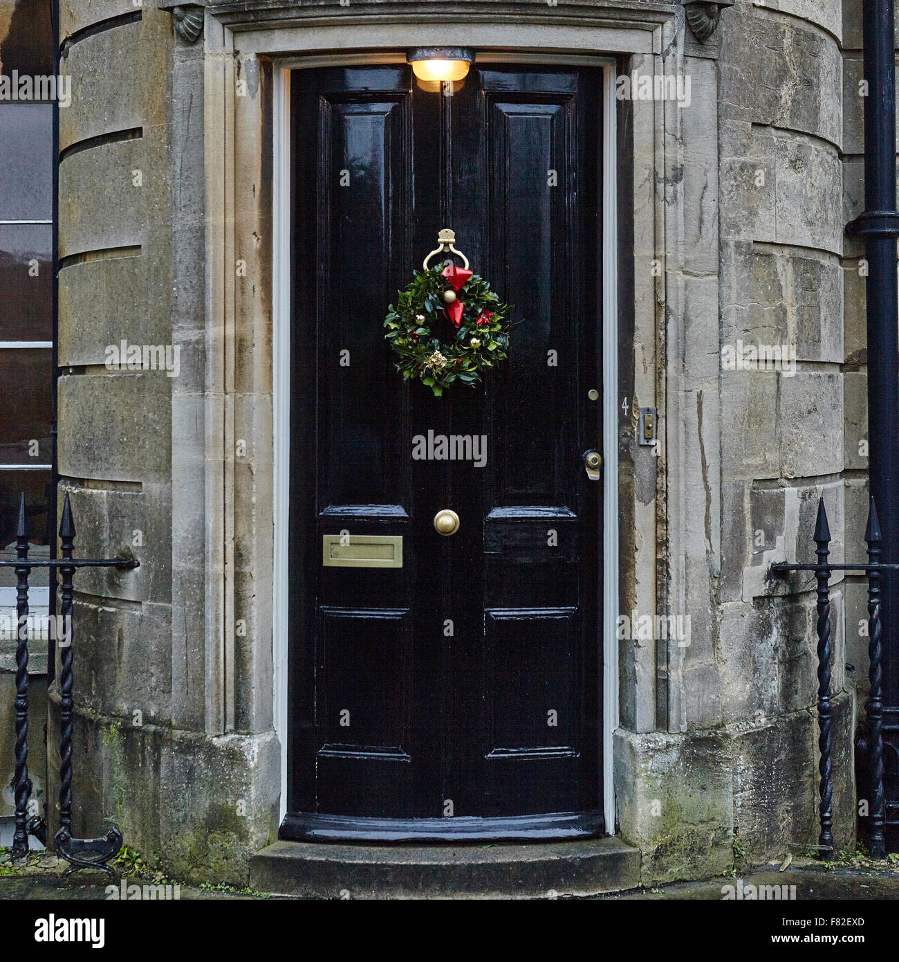 Christmas Wreath on black door Stock Photo Alamy