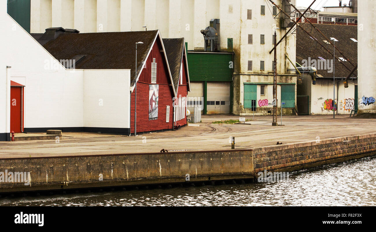 Odense old industry buildings next to canal Stock Photo