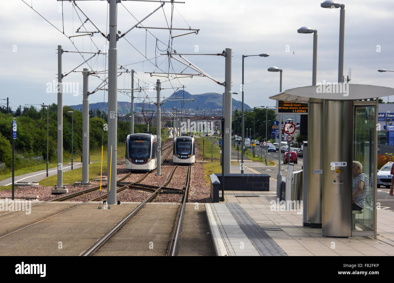 Edinburgh trams with tram stop Stock Photo Alamy