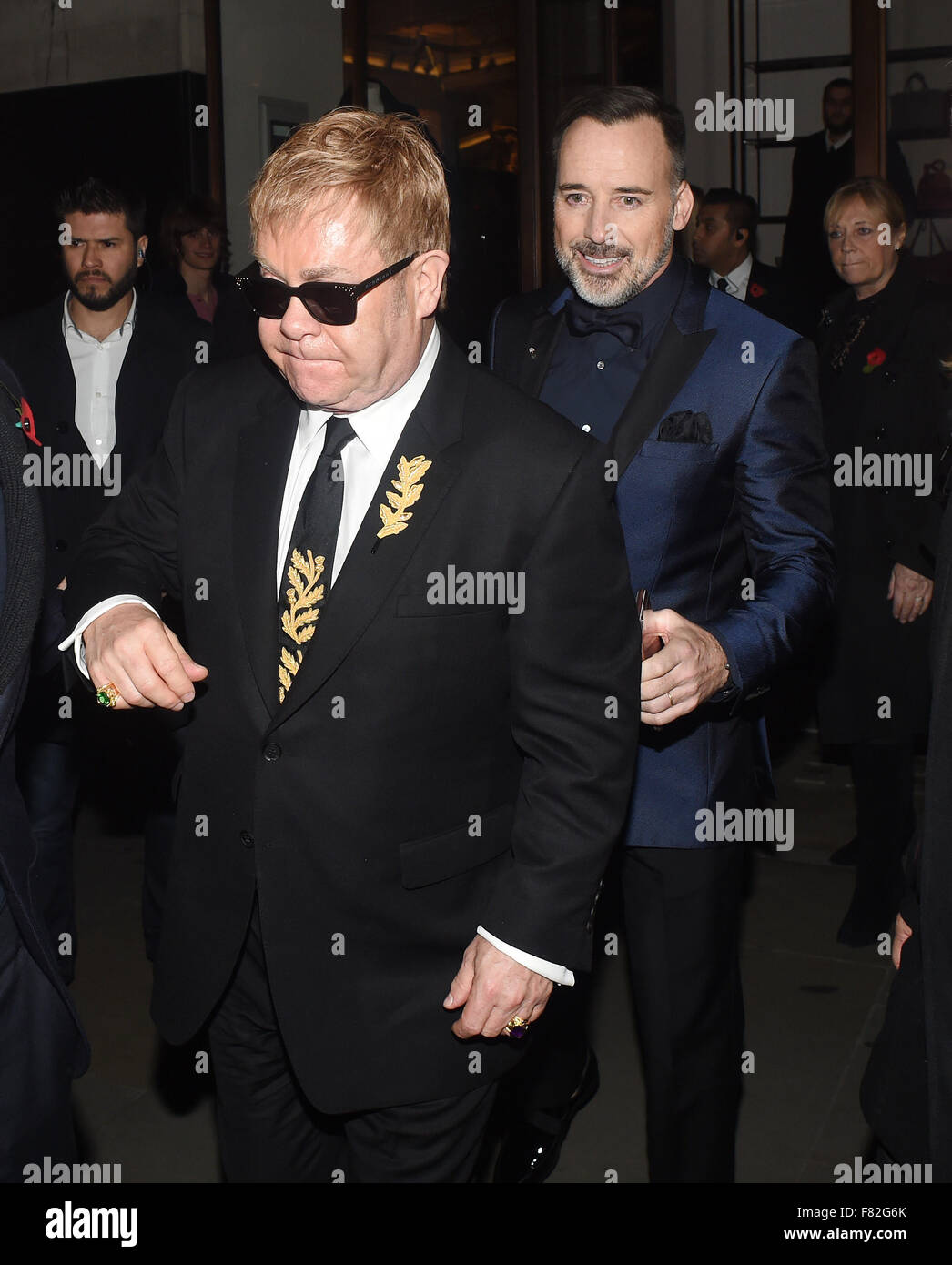 Elton John and David Furness seen leaving Burberry London after attending  its Premiere Screening. Featuring: Elton John, David Furness Where: London,  United Kingdom When: 04 Nov 2015 Stock Photo - Alamy