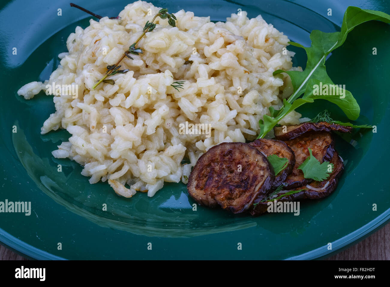 Italian trditional Risotto with eggplant and coriander Stock Photo Alamy