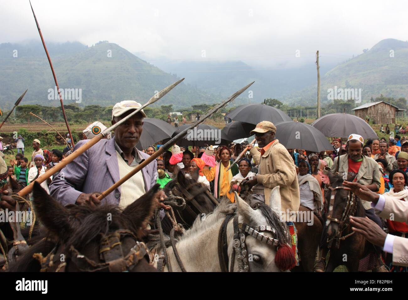 Ethiopian traditional Gurage tribal horsemen welcome visitors to a ...