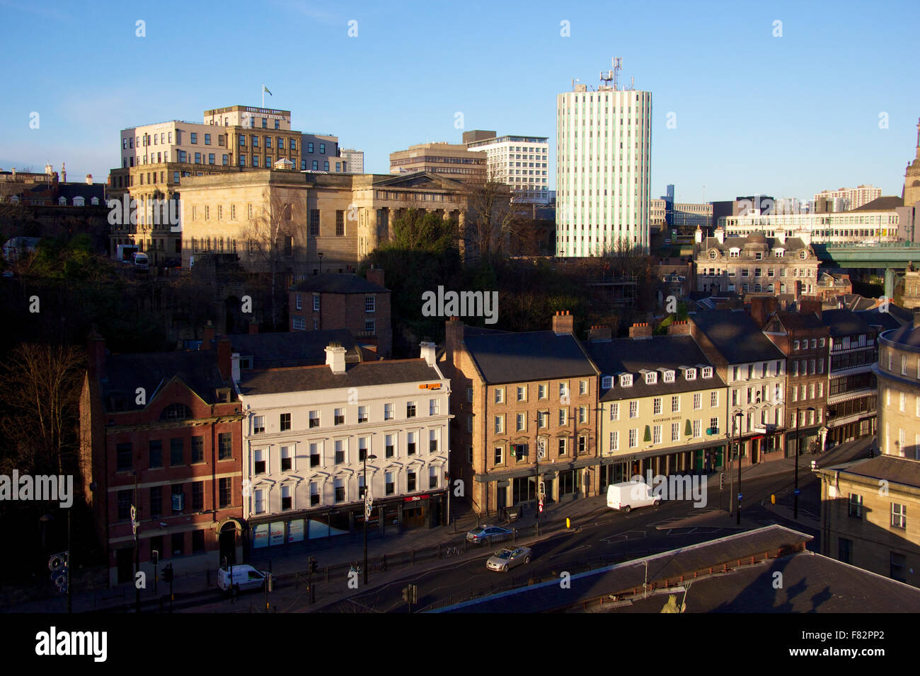 View of the oldest part of newcastle with tower blocks in background Stock Photo