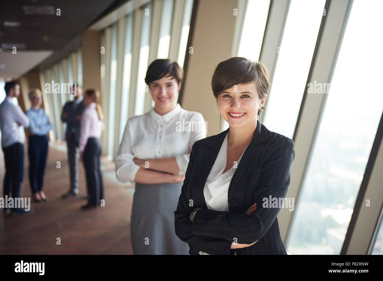 business people group, females as team leaders standing together in ...