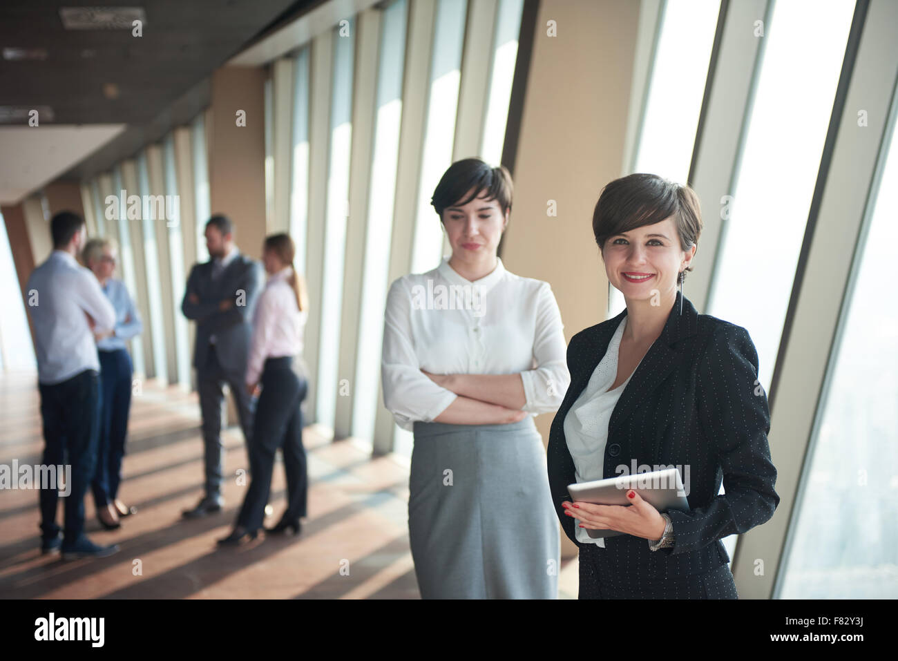 business people group, females as team leaders standing together in ...