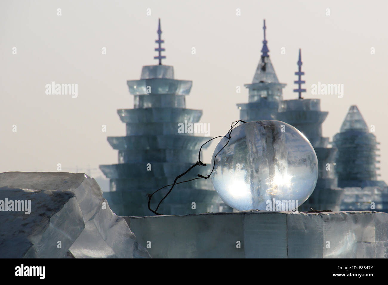 https://c8.alamy.com/comp/F8347Y/ice-ball-in-front-of-ice-buildings-in-harbin-china-F8347Y.jpg