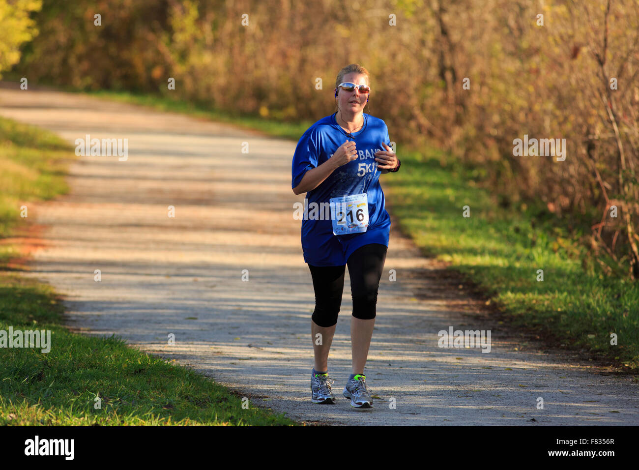 Runner on the Erie and Ohio Canal Towpath in Cuyahoga Valley National Park, Ohio. Stock Photo