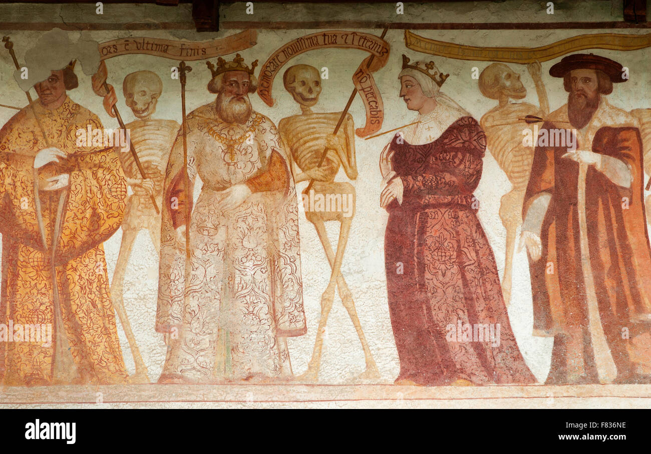A macabre dance on the wall of the church of St. Vigilio in Pinzolo - Italy Stock Photo