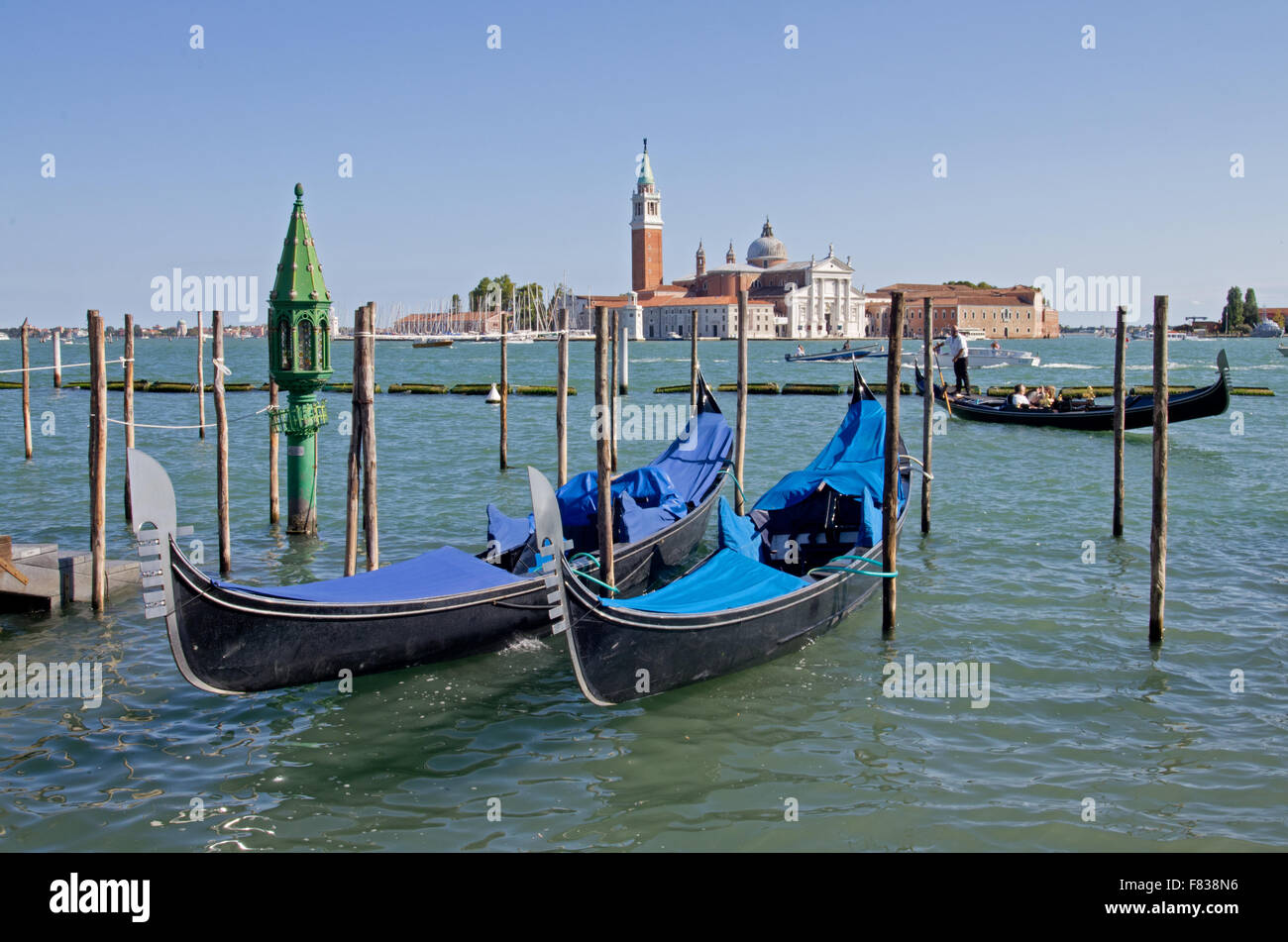 Venice San Giorgio Maggiore and gondolas Stock Photo
