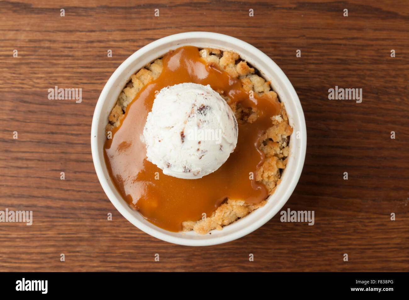 souffle with a scoop of ice cream in a ceramic bowl Stock Photo