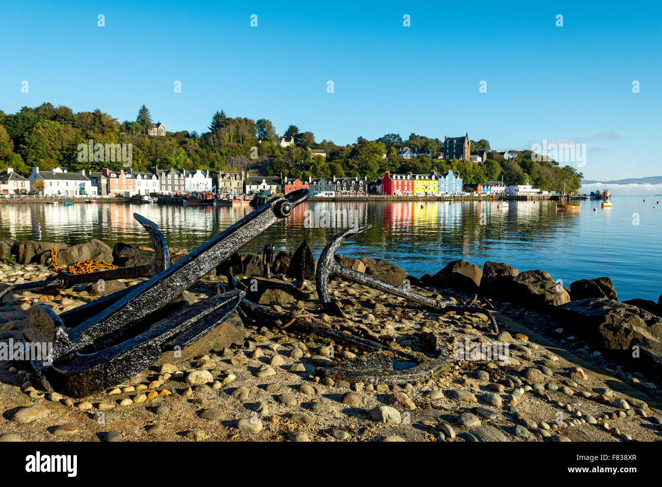 Main Street, Tobermory over the harbour, Isle of Mull, Argyll and Bute, Scotland, UK. Stock Photo
