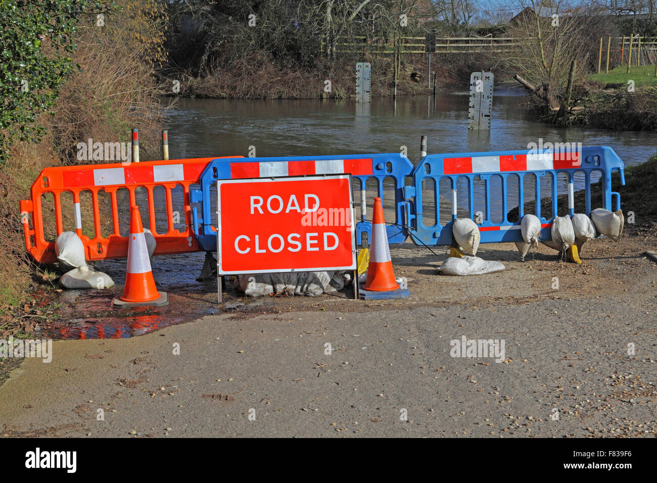 A Ford closed to all traffic and the road coned off and 'Road Closed' sign prominently displayed. Stock Photo