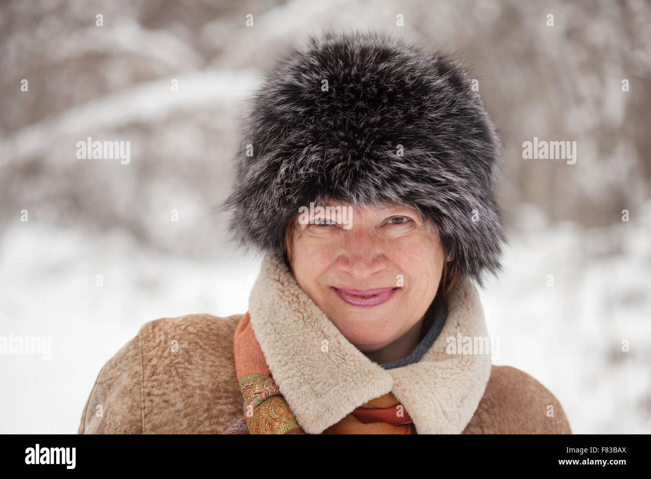 One 60s woman walking winter hi-res stock photography and images - Alamy