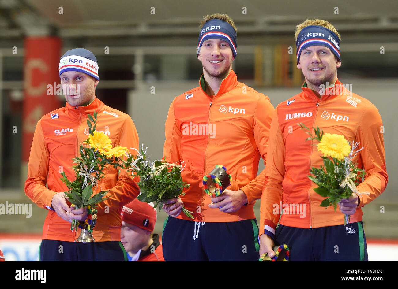 Inzell, Germany. 4th Dec, 2015. The Netherlands' Arjan Stroetinga, Jan Blokhuijsen and Douwe de Vries at the victory ceremony after coming 1st in the men's team competition of the speed skating world cup in the Max-Aicher-Arena in Inzell, Germany, 4 December 2015. PHOTO: TOBIAS HASE/DPA/Alamy Live News Stock Photo