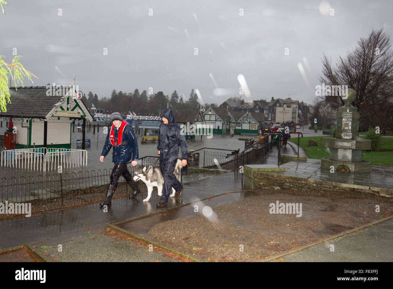 Cumbria 5th December 2015 UK Weather The Met Office issues its highest red warning for north-west England, urging against all non-essential travel.Lake Windermer &at Bowness on Windermere Buisenesss prepair for flooding Credit:  Gordon Shoosmith/Alamy Live News Stock Photo