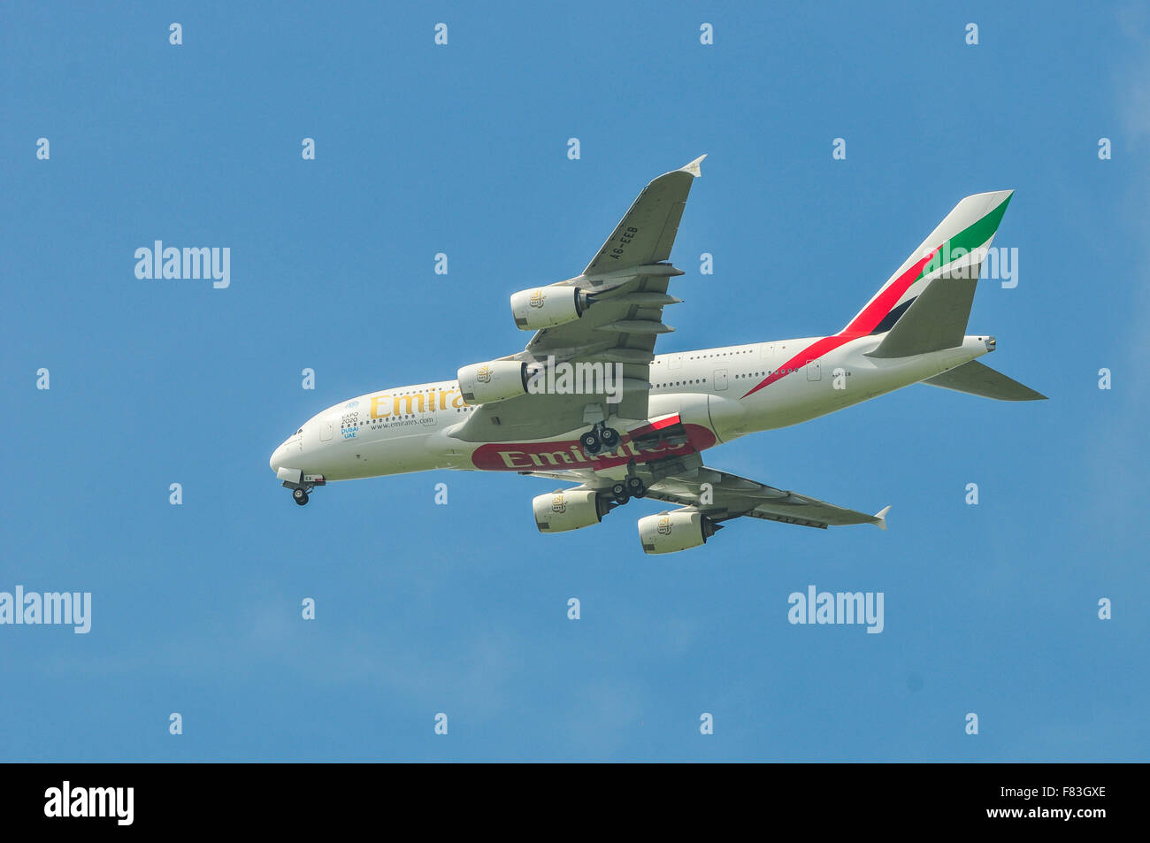 The biggest airplane of the world the A380 of Emirates flying over Assendelft a Village in the Netherlands to land in Amsterdam. Stock Photo
