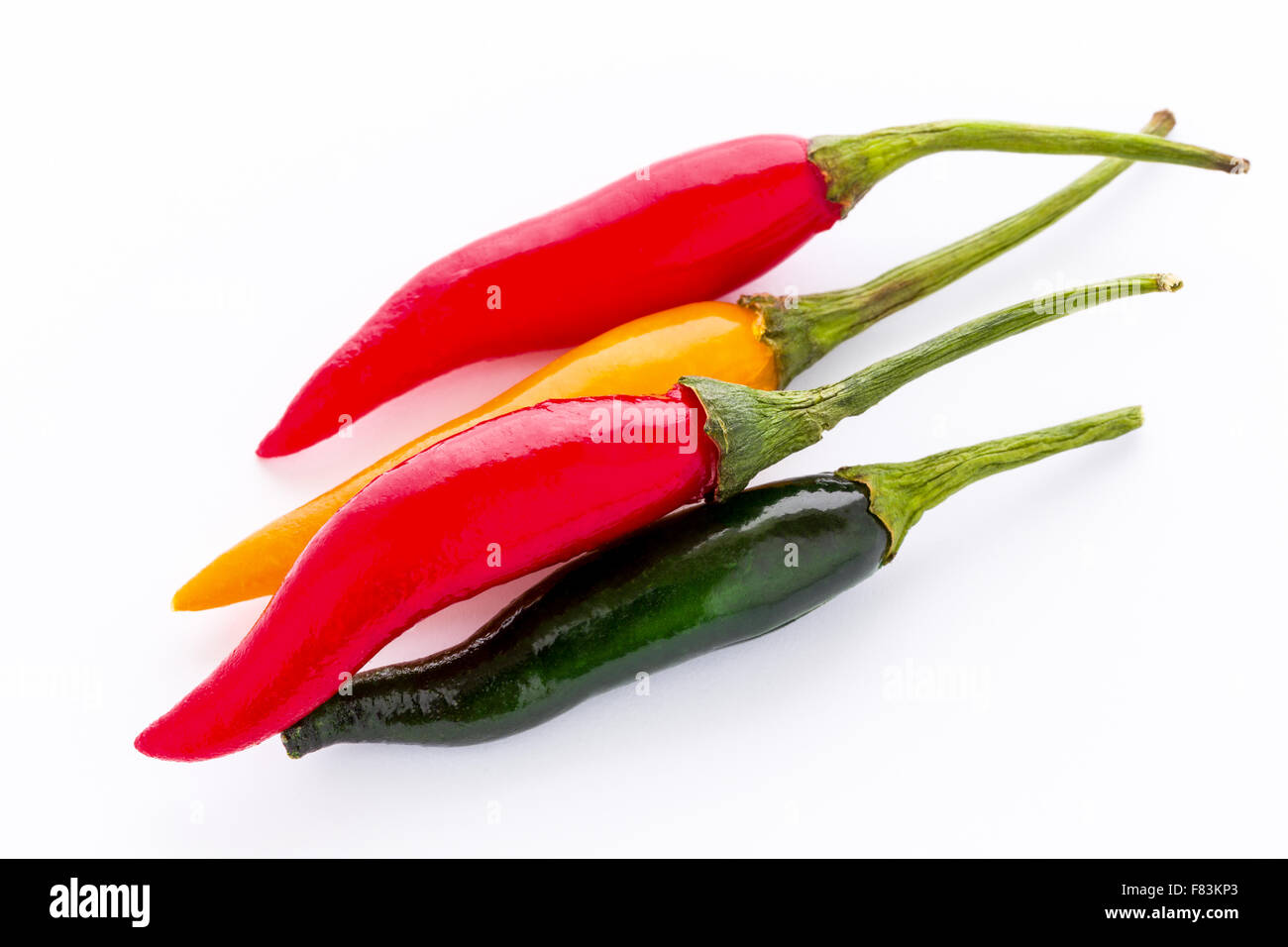 Studio isolated shot of group of chilies. Stock Photo