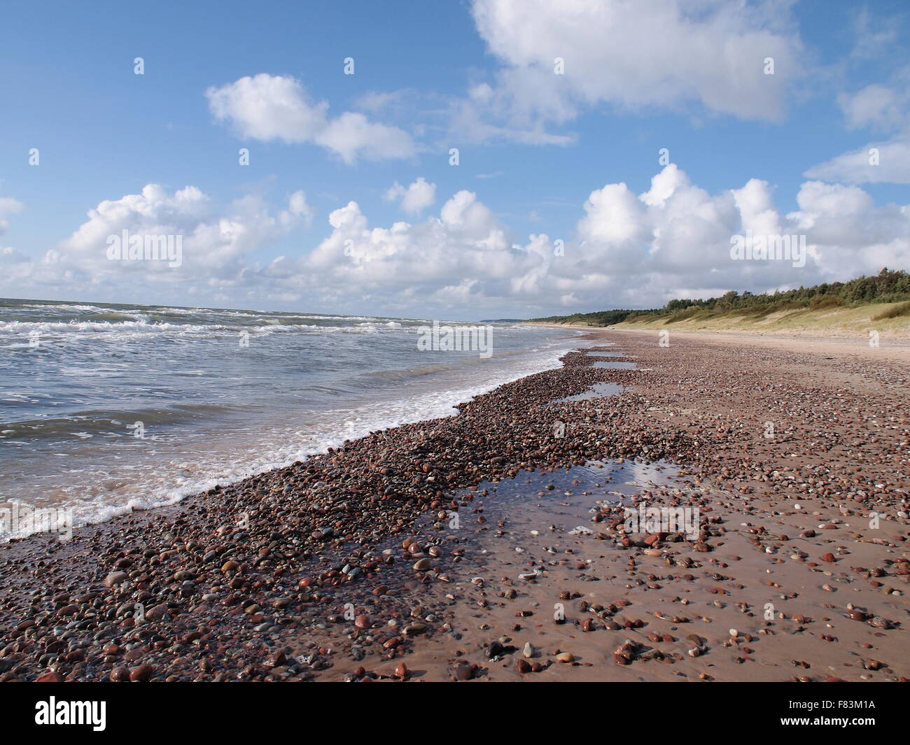 Rocky beach on the shore of Baltic Sea in Jurkalne, Kurzeme, Latvia. Stock Photo