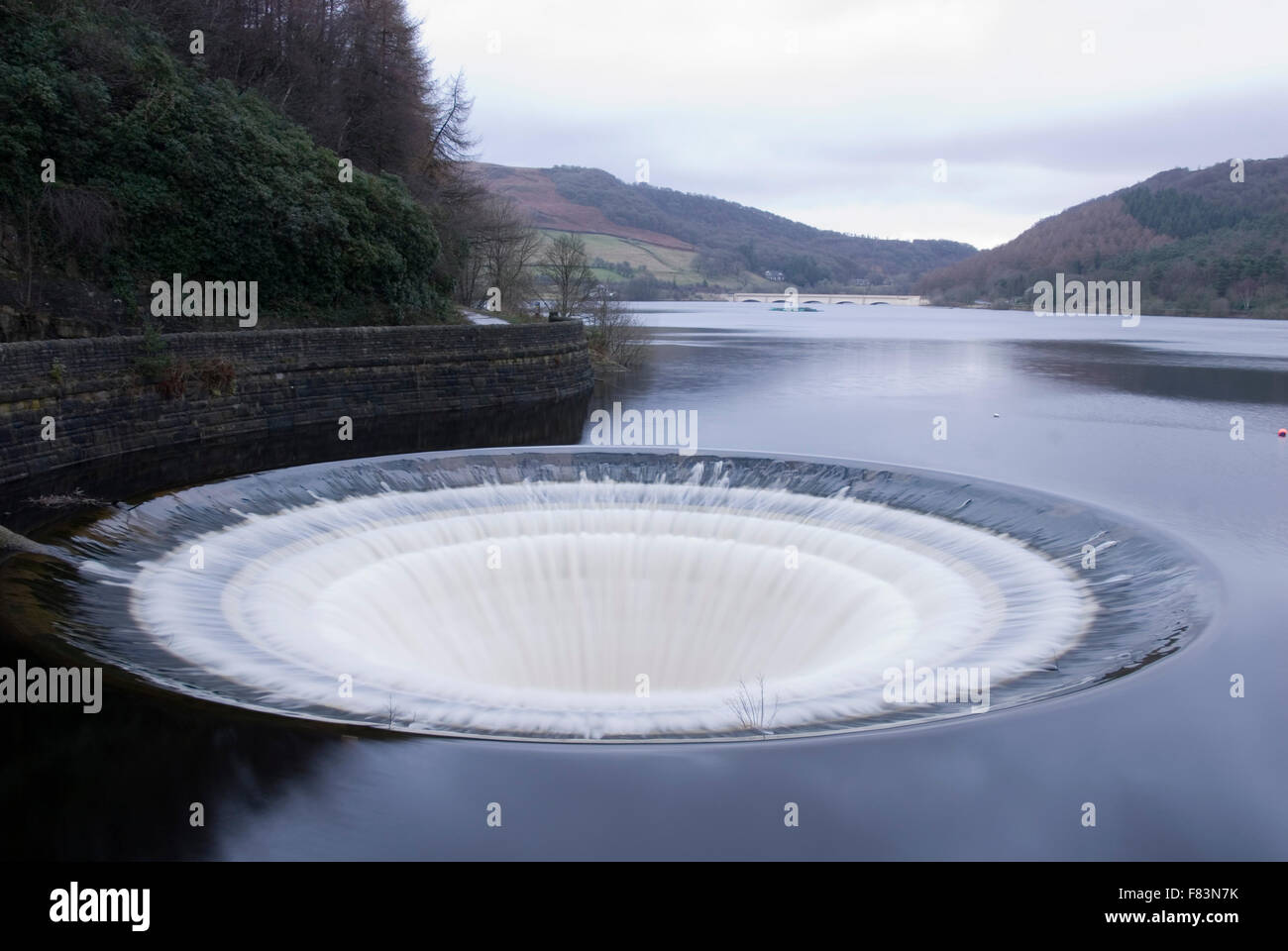 DERBYSHIRE UK - 06 Oct : Ladybower reservoir bellmouth overflow (or plug hole) and draw off tower on 16 Feb 2014 in the Peak Dis Stock Photo