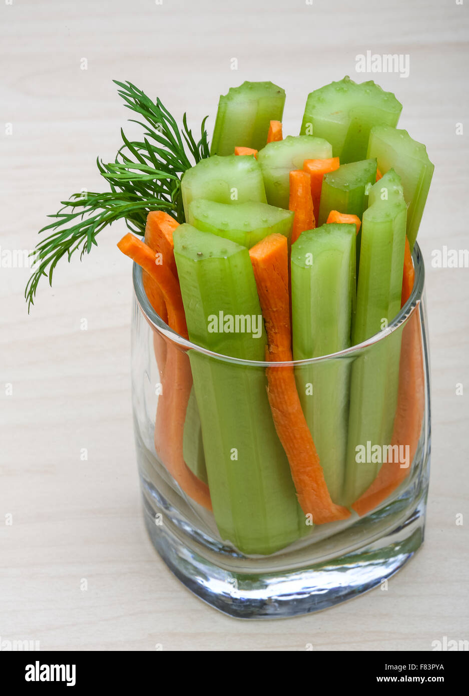 Celery and carrot sticks in the glass Stock Photo - Alamy
