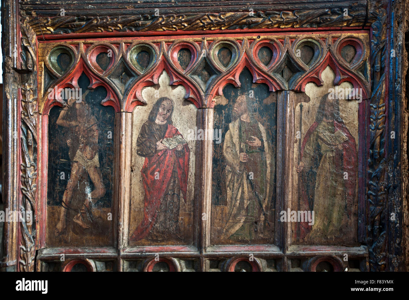 Paintings on wooden rood screen choir stall Church St. Pancras Widecombe-in-the-Moor Dartmoor Devon England UK Europe Stock Photo