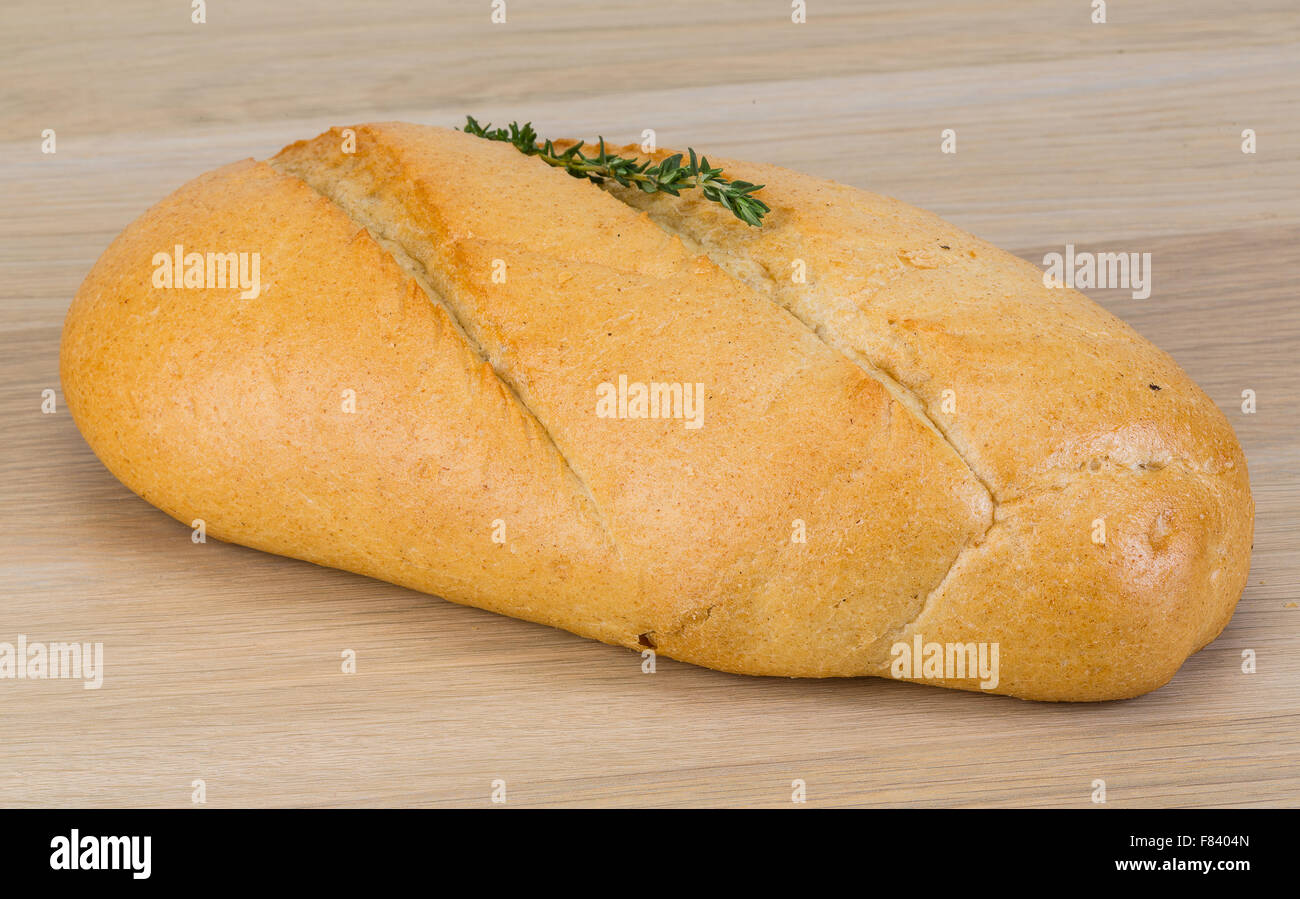 Baguette bread with thyme on the wood background Stock Photo Alamy