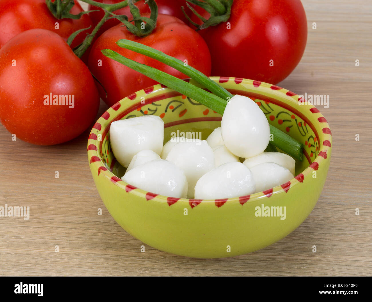 Mozzarella cheese balls with onion and tomato branch Stock Photo Alamy