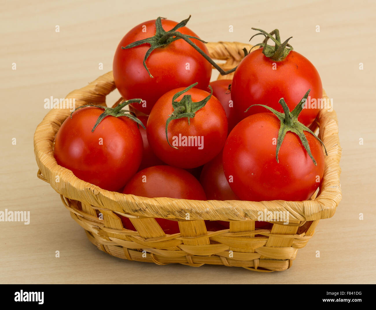 Fresh ripe Cherry tomatoes in the basket Stock Photo - Alamy