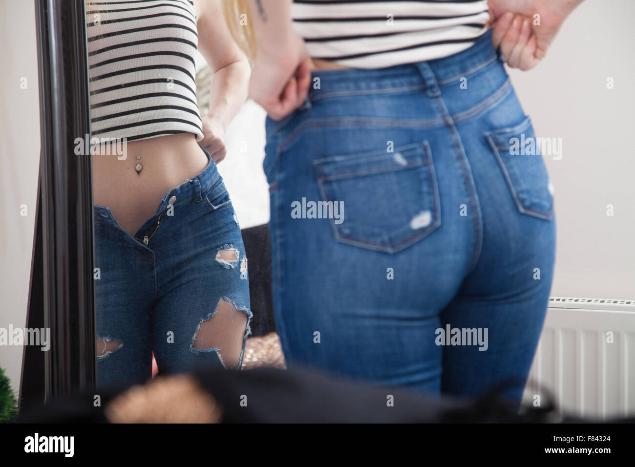 Woman tight jeans hi-res stock photography and images - Alamy