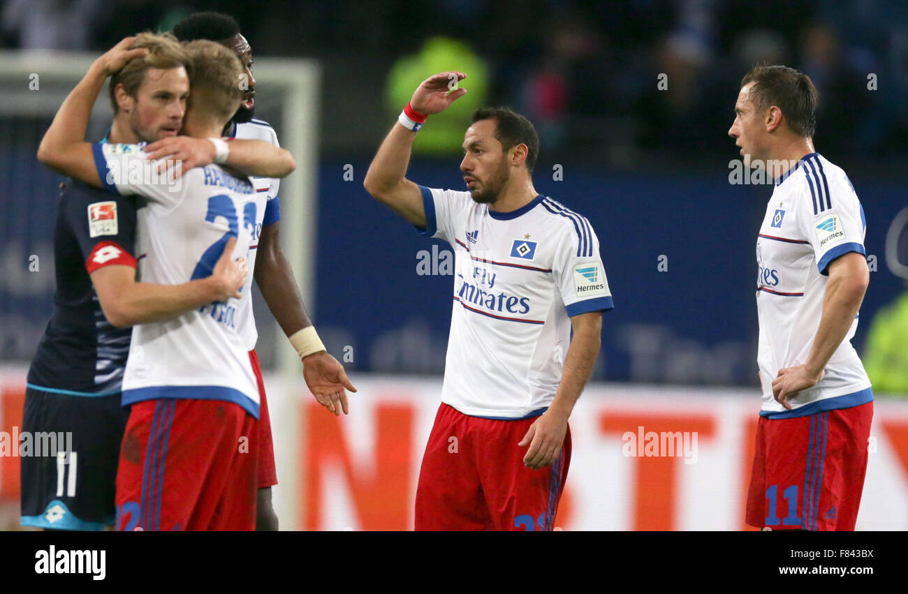 Hamburg, Germany. 5th Dec, 2015. Mainz' Maximilian Beister (l-r), Hamburg's Matthias Ostrzolek, Hamburg's Johan Djourou (hidden), Hamburg's Marcelo Diaz and Hamburg's Ivica Olic pictured after the German Bundesliga football match between Hamburger SV and FSV Mainz 05 at the Volksparkstadion in Hamburg, Germany, 5 December 2015. PHOTO: AXEL HEIMKEN/DPA (EMBARGO CONDITIONS - ATTENTION: Due to the accreditation guidelines, the DFL only permits the publication and utilisation of up to 15 pictures per match on the internet and in online media during the match.) Credit:  dpa/Alamy Live News Stock Photo