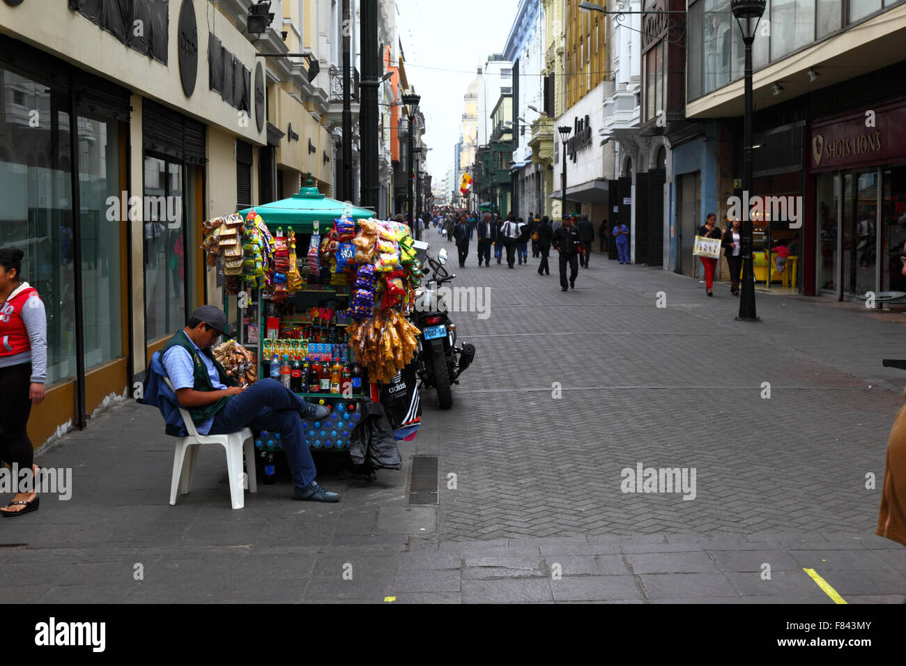 Street vendor and stall in Jiron Union street, central Lima, Peru Stock Photo