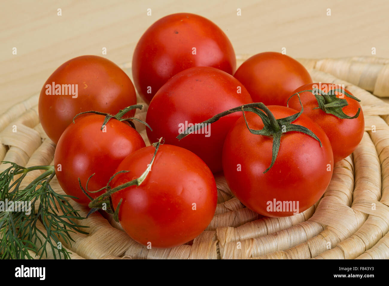 Fresh ripe Cherry tomatoes in the basket Stock Photo - Alamy