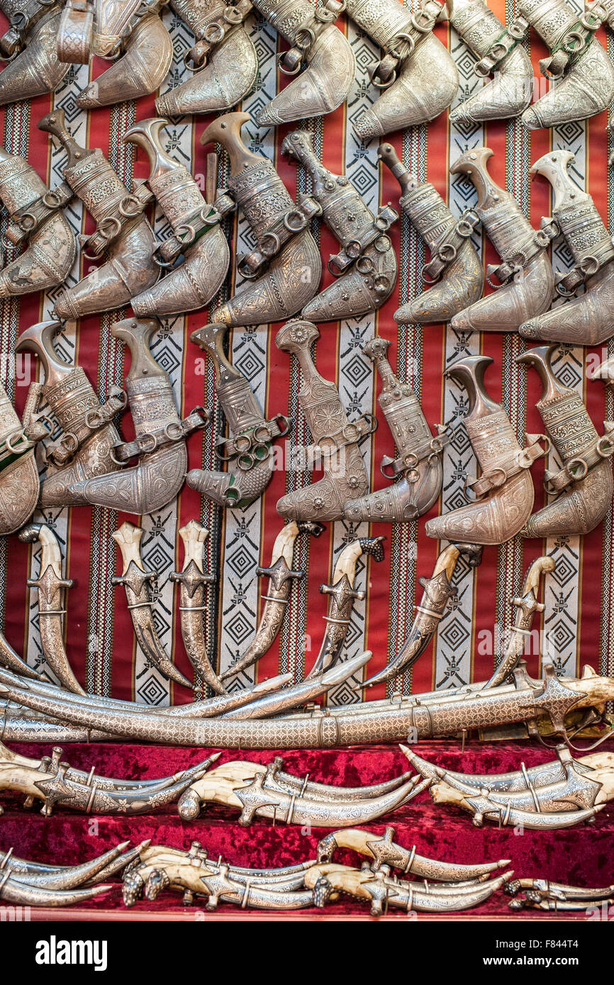 Traditional Omani Khanjar daggers for sale in the Mutrah souk in Muscat, the capital of the Sultanate of Oman. Stock Photo
