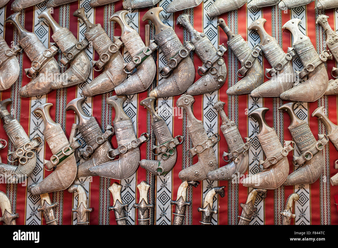 Traditional Omani Khanjar daggers for sale in the Mutrah souk in Muscat, the capital of the Sultanate of Oman. Stock Photo
