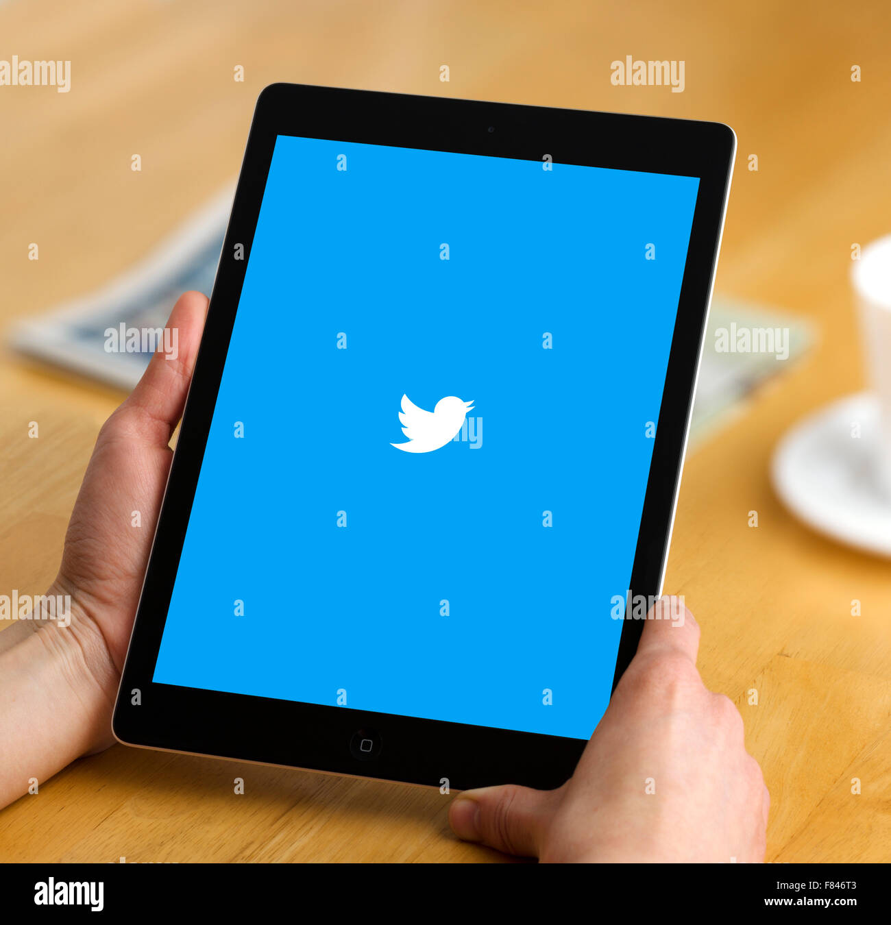 The Twitter app viewed on an iPad Air Stock Photo