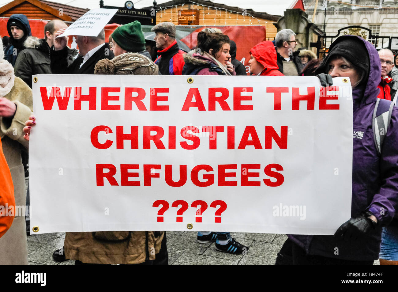 Belfast, Northern Ireland. 05 Dec 2015 - Two women hold up a sign asking 'Where are the Christian Refugees?' as the Protestant Coalition hold a protest against Islamic refugees coming to Northern Ireland. Credit:  Stephen Barnes/Alamy Live News Stock Photo