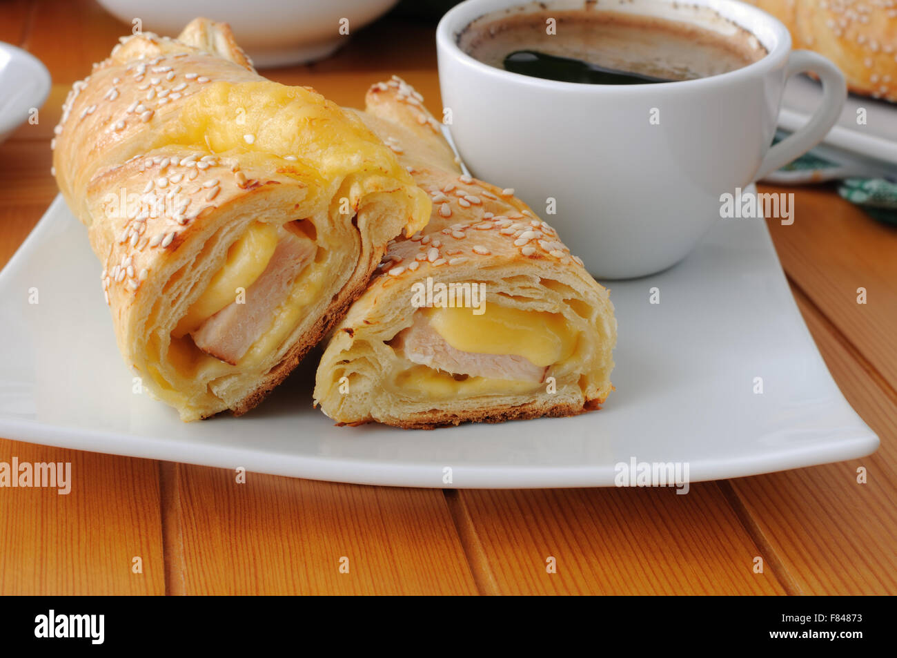 baked puff pastry with ham and cheese Stock Photo