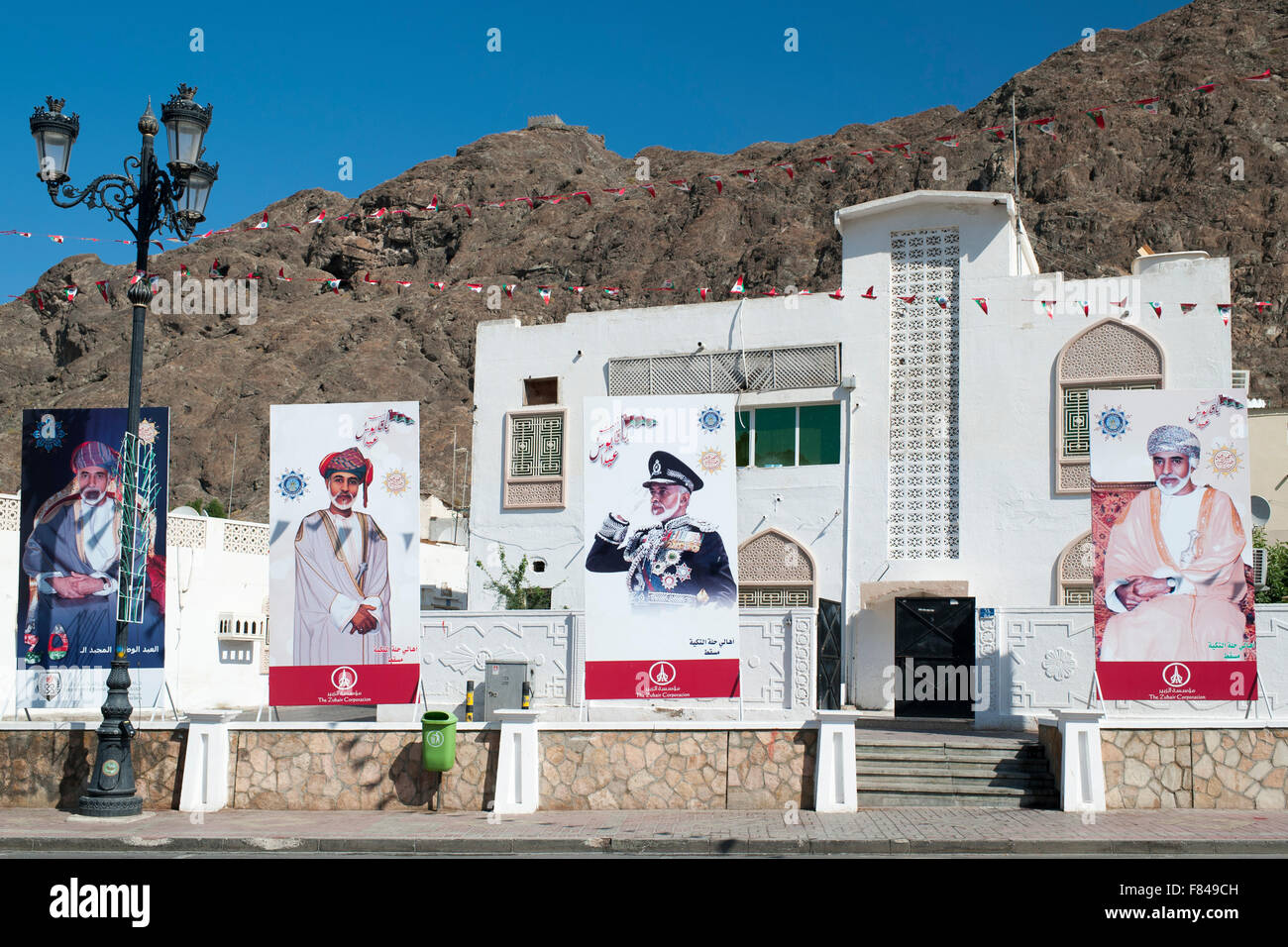Posters of the Sultan of Oman in Old Muscat, part of the capital of the Sultanate of Oman. Stock Photo