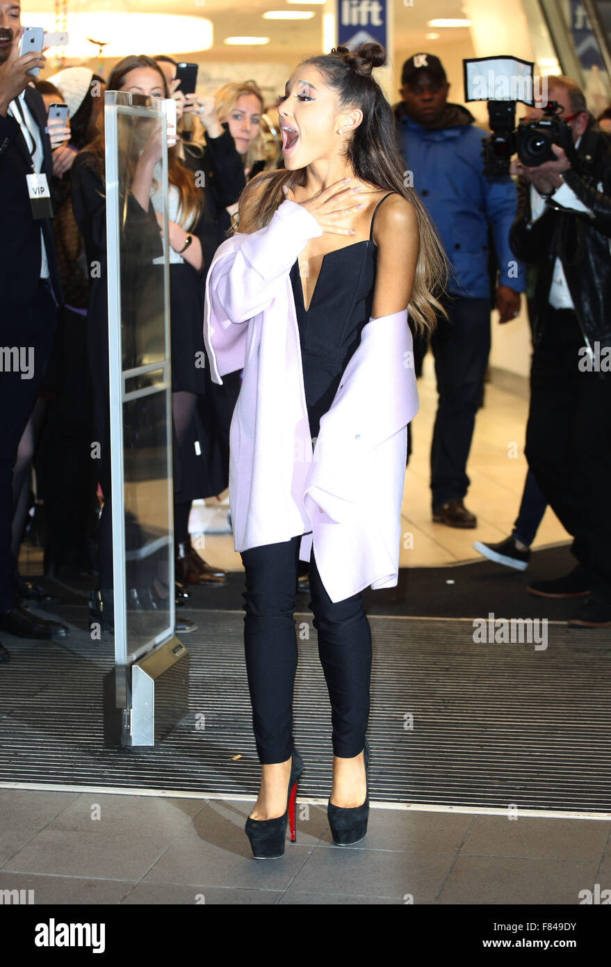 Ariana Grande launches her debut fragrance, Ari by Ariana Grande and does a  meet and greet at Boots. She was over an hour late and charged fans £103.00  to take part in