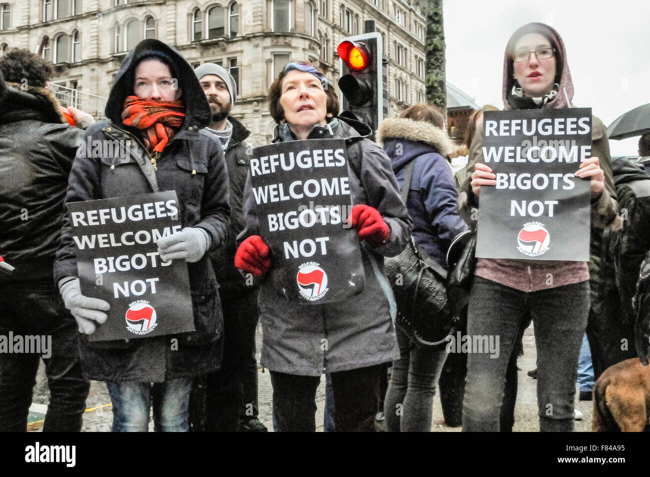 Belfast, Northern Ireland. 05 Dec 2015 - Pro-refugee supporters gather to protest against the Protestant Coalition's anti-refugee rally. Credit:  Stephen Barnes/Alamy Live News Stock Photo