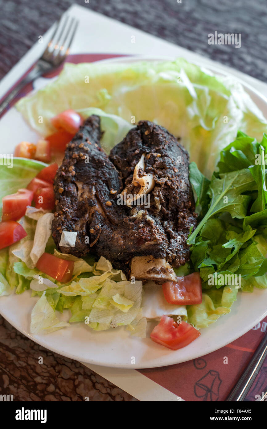Lamb shewa, a traditional Omani dish as served by the Al Maida restaurant in Muscat, the capital of the Sultanate of Oman. Stock Photo