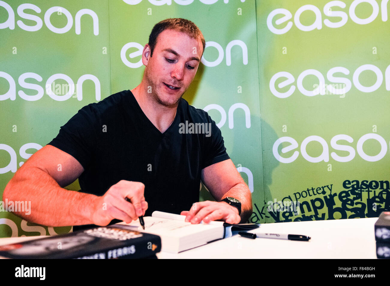 Belfast, Northern Ireland. 05 Dec 2015 - Ulster Rugby player Stephen Ferris signs his latest book in Belfast Credit:  Stephen Barnes/Alamy Live News Stock Photo