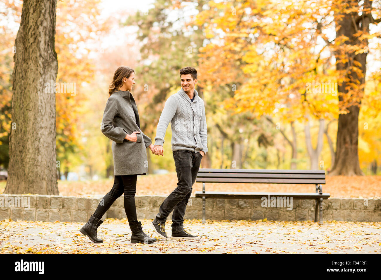 Loving couple in the autumn park Stock Photo - Alamy