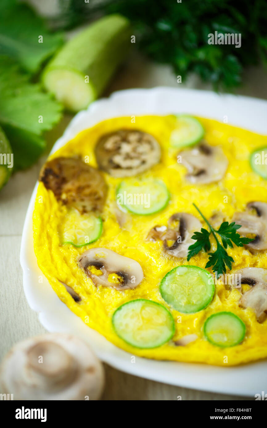 fried omelette with zucchini Stock Photo - Alamy